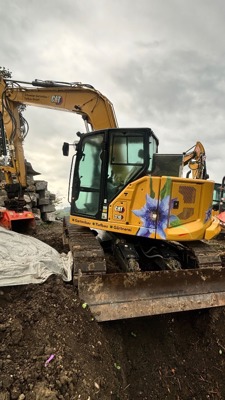 Raupenbagger Caterpillar 310 next gen.